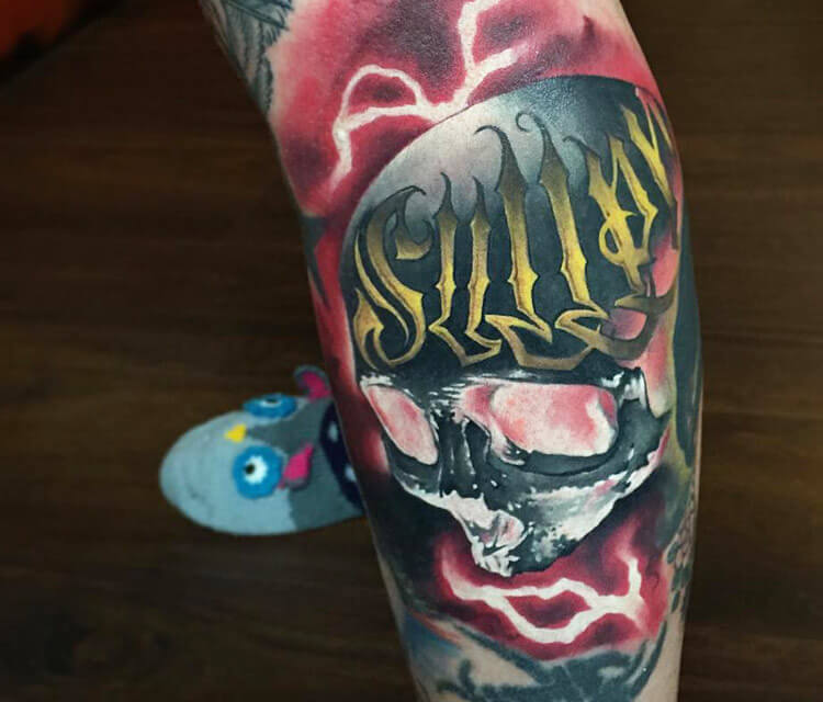 Sullen Skull tattoo by Benjamin Laukis