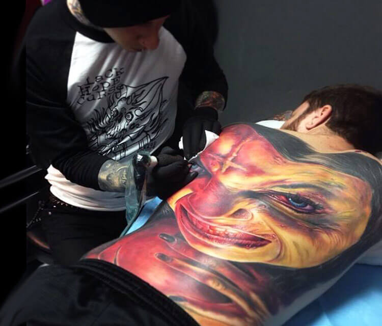 Backpiece tattoo, at work Paul Acker
