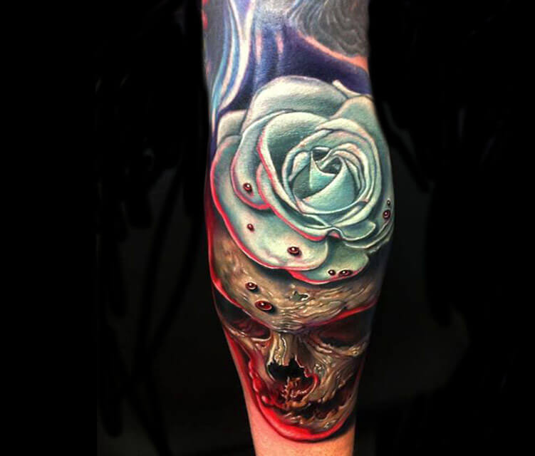 Skull & rose tattoo by Paul Acker
