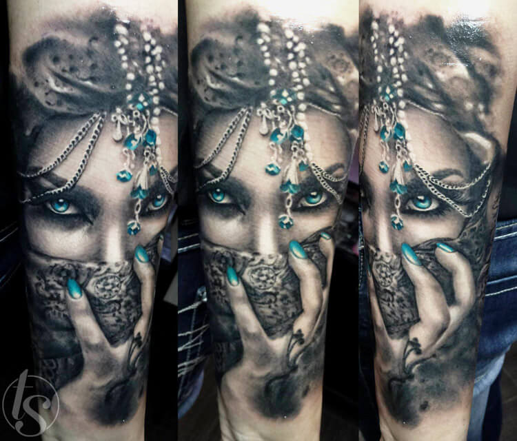 Woman mask black and blue tattoo by Zsofia Belteczky